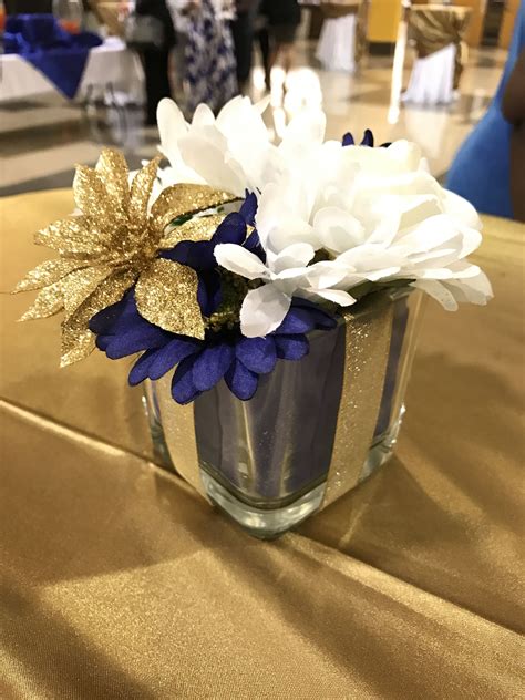 gold and navy party decorations|navy blue and gold centerpieces.